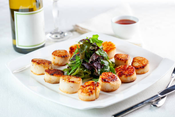 istock Fried Scallops Plate Paired with White Wine 2193507519