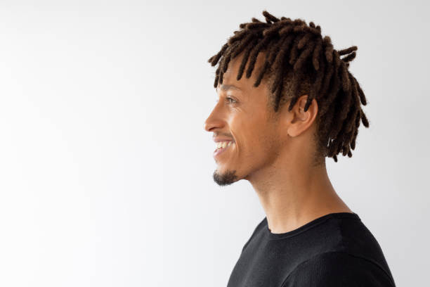 istock Handsome male with afro hairstyle side view 2193509950