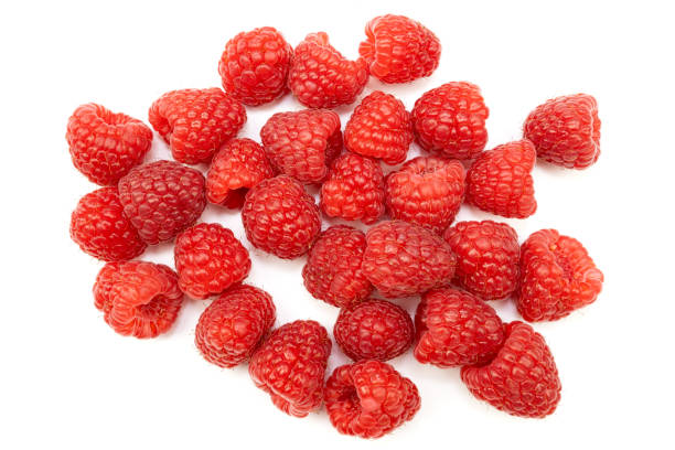 istock pile of fresh raspberries, close-up, isolated on a white background 2193514342