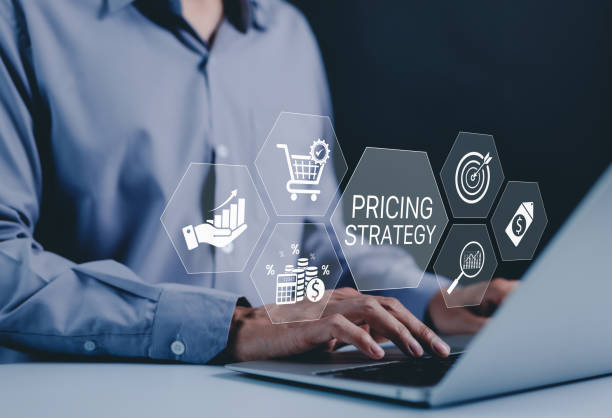 istock Pricing Strategy and Business Planning Concept. Businessman working on a laptop with digital icons displaying pricing strategy, financial growth, and analytics for decision-making. e-commerce, price, 2193514652