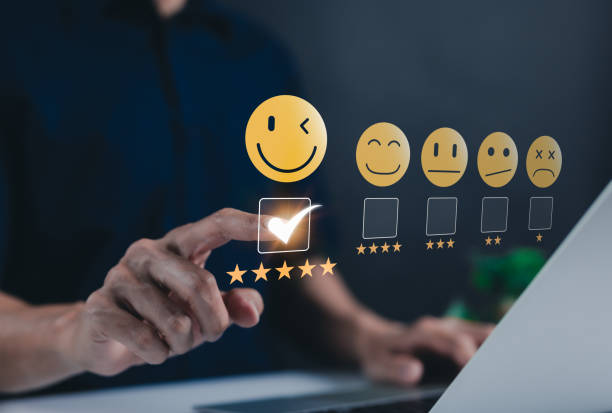 istock Customer review satisfaction feedback survey concept. A user selects five star rating on a virtual interface, showcasing customer satisfaction, feedback, and survey evaluation in internet networking. 2193514655