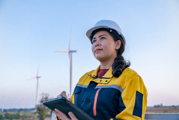 istock An Asian Confident Female Engineer Evaluating Wind Turbine Performance with Digital Tablet in Renewable Energy Field, Nakhon Ratchasima, Thailand 2193523948