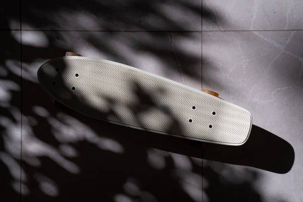istock Skateboard details on shadowy ground, colorful wheel, pattern 2193526383
