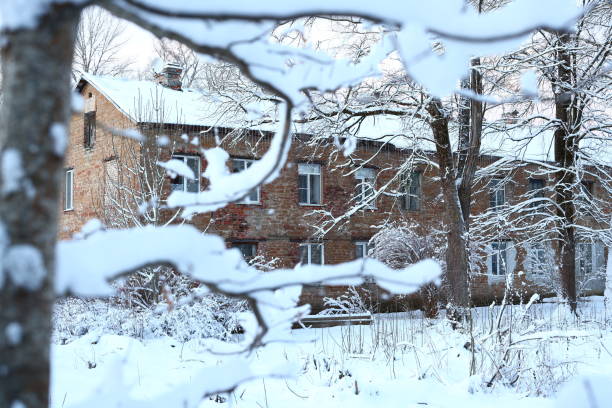 istock A stunning, snowy winter landscape featuring a charming rustic building surrounded by tranquility 2193528611