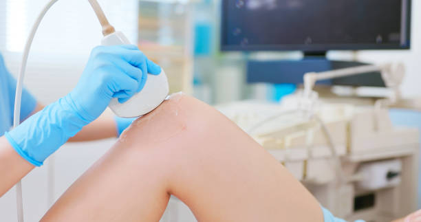 istock young female knee injury ultrasound 2193530256