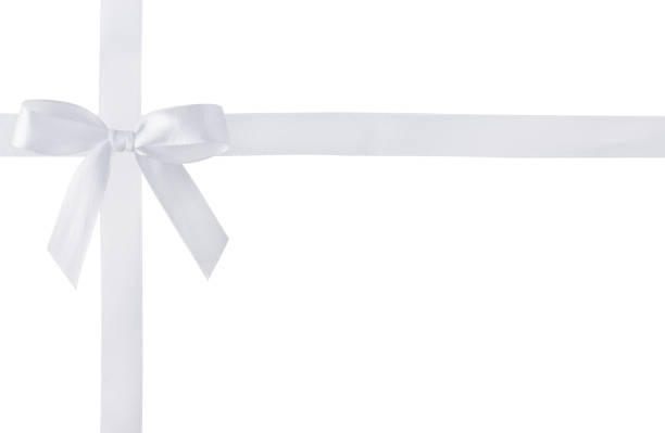 White silk ribbon bow isolated on white background. Satin tied bow for design.