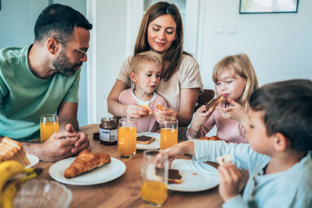 istock Happy family having breakfast 2193534765