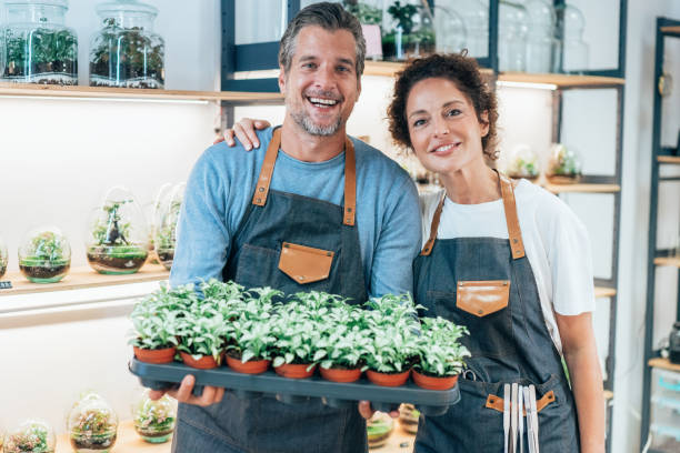 istock Cheerful flower shop workers 2193534766
