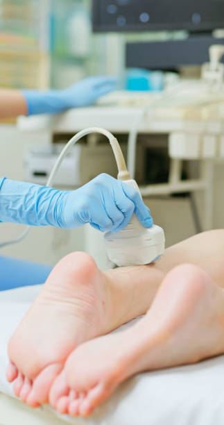 istock female ankle injury ultrasound 2193535158