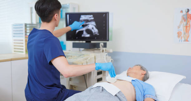 istock elder receive abdominal ultrasound 2193535345