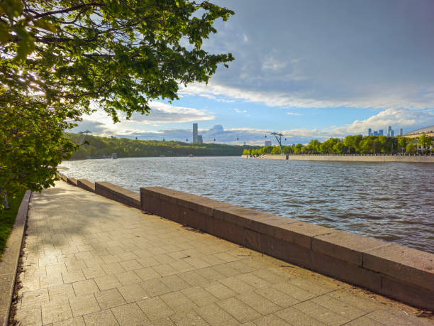 istock Green walkway along the Moscow River promenade. 2193537489