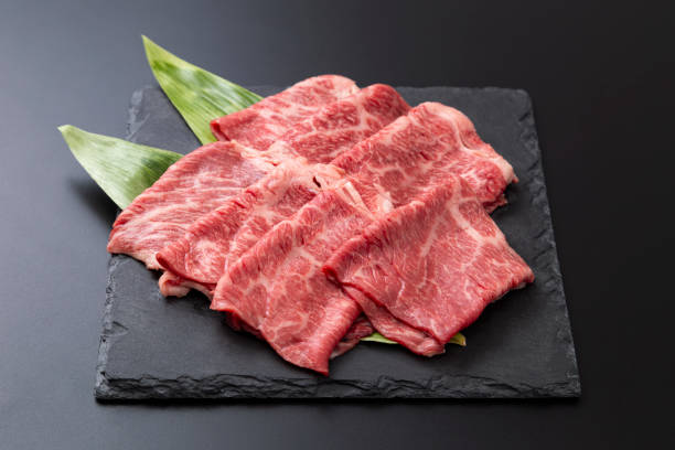 istock Beef shoulder loin for sukiyaki on a black background 2193539393