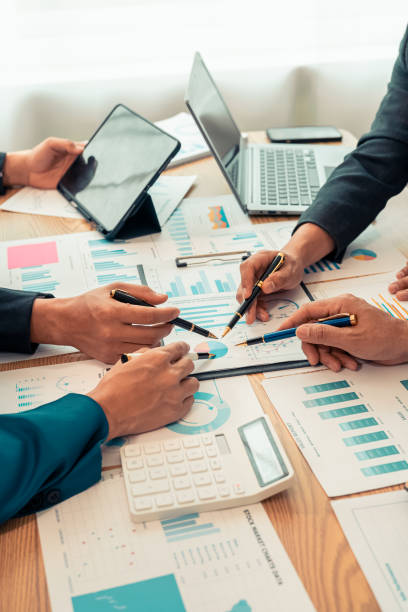 istock Planning data, annual reports, research and budgets in the office Company discussion with documents in strategy meeting Chart analysis vertical close-up image 2193542254