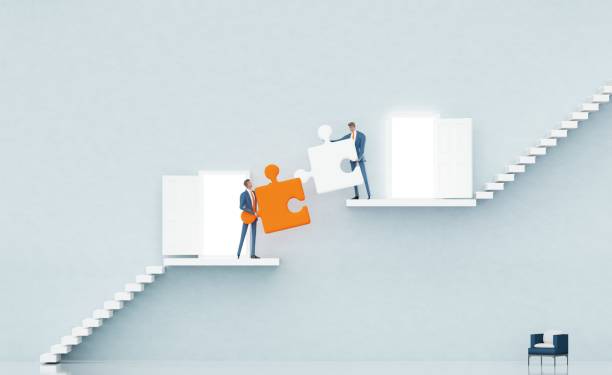 istock Business people are working together with puzzles. 3d Rendering 2193544194