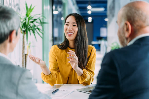 istock Group of business persons talking in the office. 2193548213
