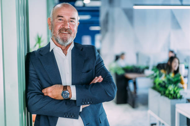 istock Confident businessman and his team. 2193548215