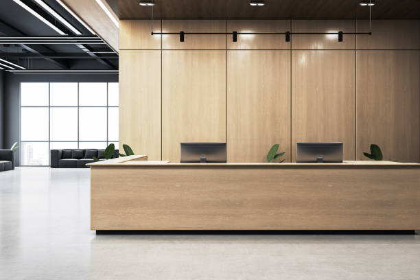 istock Modern office reception interior with light wooden desk, blank wall, and clean design in corporate business center. 3D Rendering 2193549754
