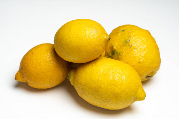 Fresh Lemon organing food on a withe background