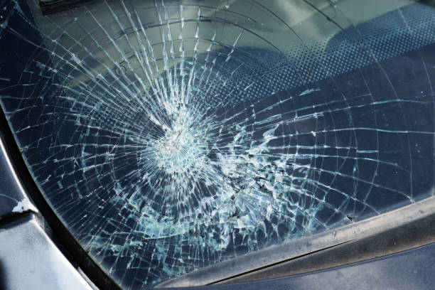 istock Close-up of a broken windshield of a car. 2193552791