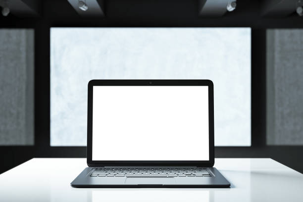 Open laptop with blank white screen, metallic desk, dark modern office environment, abstract background, concept of digital workspace. 3D Rendering.