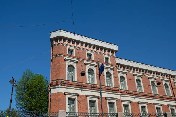 istock Historic brick building stands against a clear blue sky in urban setting during sunny afternoon 2193554731