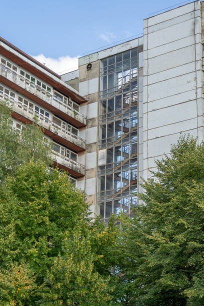 Abandoned sanatorium. Conserved multi-storey building with windows and balconies. Modernism in architecture of the 1960s. Ukraine, Truskavets resort.