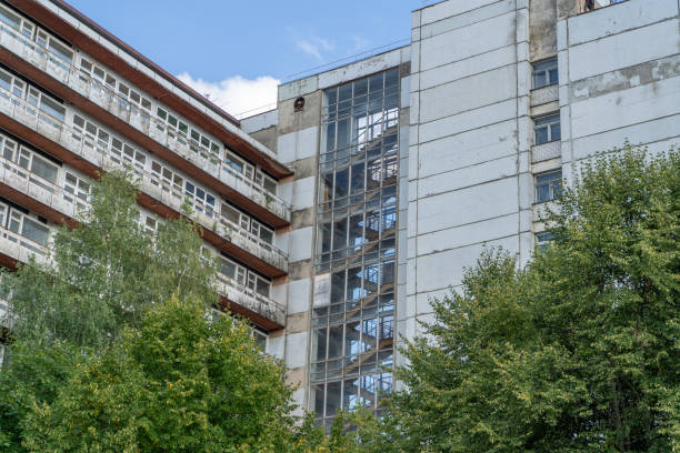 Abandoned sanatorium. Conserved multi-storey building with windows and balconies. Modernism in architecture of the 1960s. Ukraine, Truskavets old resort hotel
