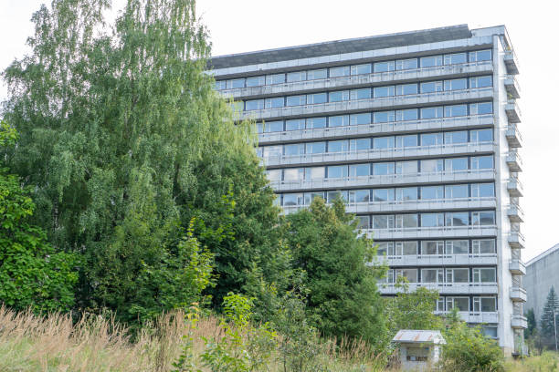 istock Abandoned sanatorium. Conserved multi-storey building with windows and balconies. Modernism in architecture of the 1960s. Ukraine, Truskavets resort. 2193556069
