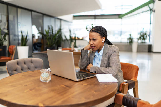 istock Frustrated businesswoman arguing with someone during a video call over computer 2193558376
