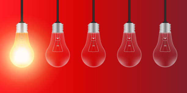 istock Light Bulbs with Glowing Lamps on Red Background. Decorative Light Bulbs for Christmas Background. 2193559871