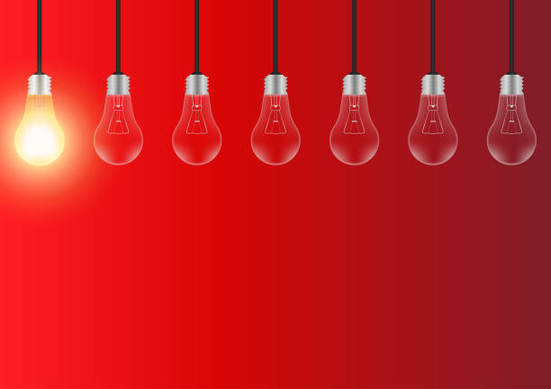 istock Light Bulbs with Glowing Lamps on Red Background. Decorative Light Bulbs for Christmas Background. 2193560062