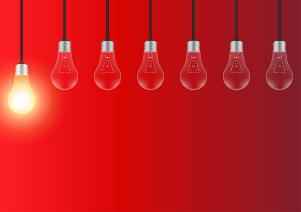 istock Light Bulbs with Glowing Lamps on Red Background. Decorative Light Bulbs for Christmas Background. 2193560785