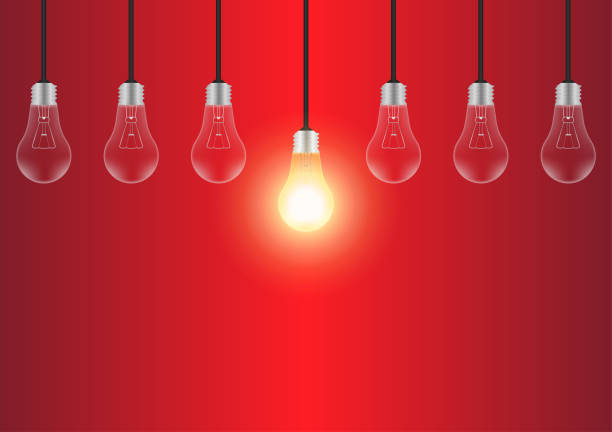 istock Light Bulbs with Glowing Lamps on Red Background. Decorative Light Bulbs for Christmas Background. 2193561068