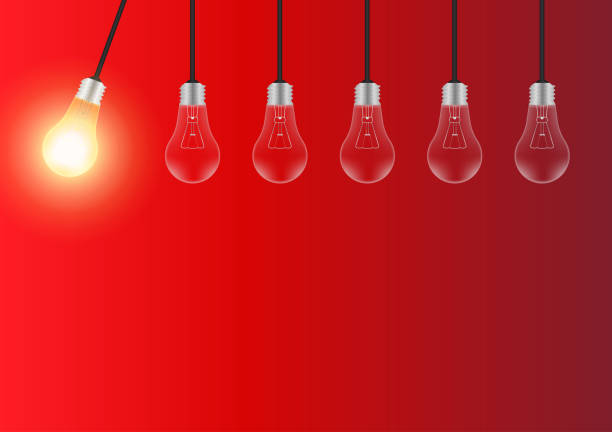 istock Light Bulbs with Glowing Lamps on Red Background. Decorative Light Bulbs for Christmas Background. 2193561451