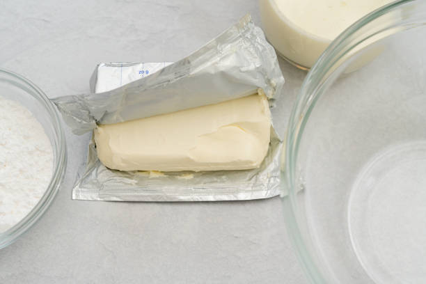 istock Cream cheese whipped cream recipe. Ingredients close-up on a kitchen table 2193561961