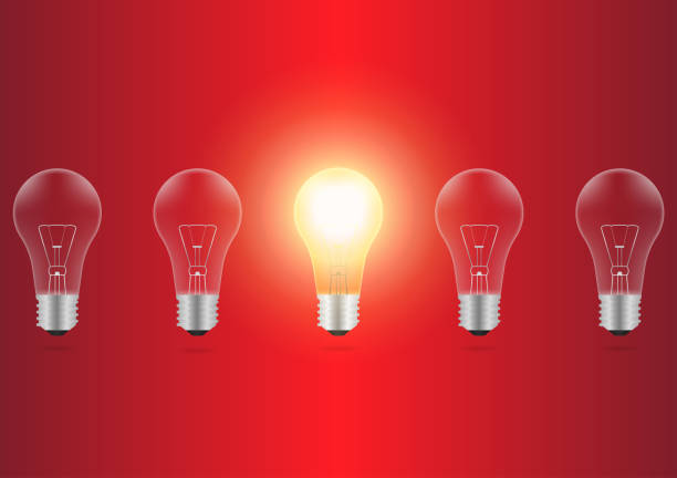 istock Light Bulbs with Glowing Lamps on Red Background. Decorative Light Bulbs for Christmas Background. 2193562099