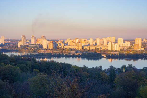 istock A panoramic urban landscape view from an elevated point, showcasing a densely populated city skyline stretching along the shore The reflection of buildings on water, clear blue sky without clouds, a 2193564679