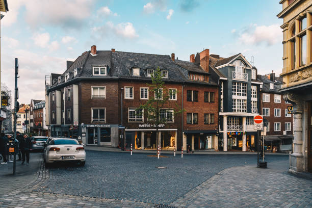 Aachen, Germany - Apr 23, 2024 - Empty paved streets on the late afternoon in the historical part of the city
