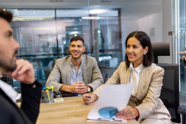istock Workers group and team leader having teamwork discussion managing project at work in meeting room. 2193579533