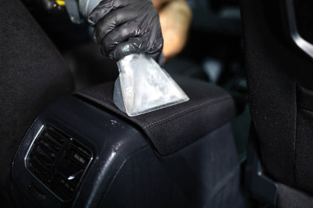 istock Deep vacuum cleaning of car interior. 2193580405