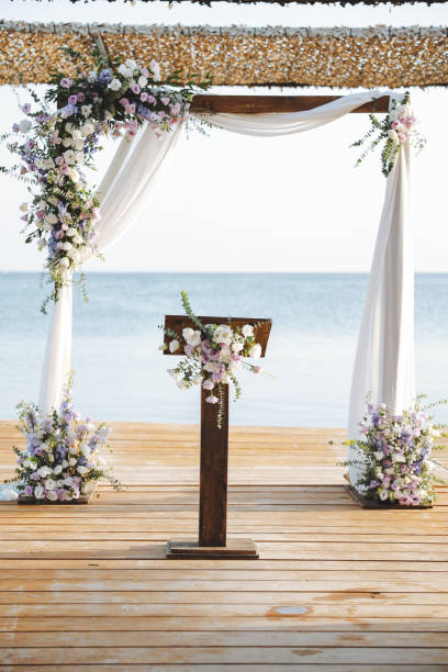 istock Beautiful wedding arch on the beach 2193581381