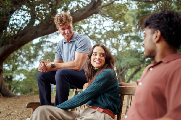 istock Three cheerful friends having fun at public park in Sydney 2193588530