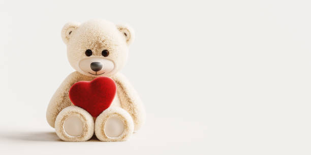 istock Cute teddy bear holding red heart on white background with copy space. Valentine's day concept design. 2193588544