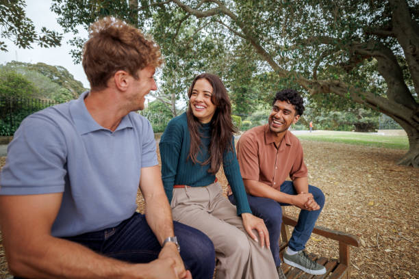 istock Three cheerful friends having fun at public park in Sydney 2193588639