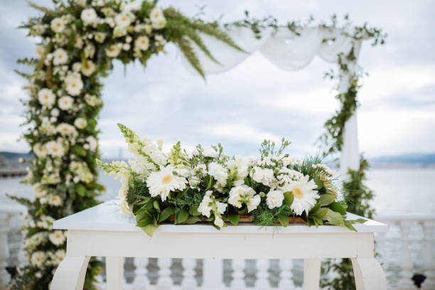 istock Beautiful wedding arch by the sea 2193590269