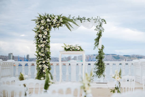 istock Beautiful wedding arch by the sea 2193590395