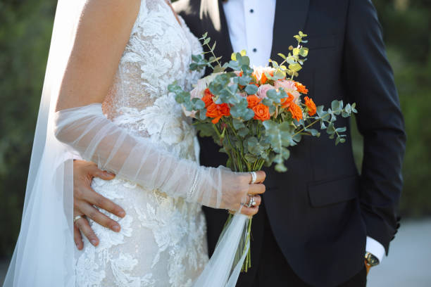 istock Bride and groom outdoors on a wedding day 2193590953