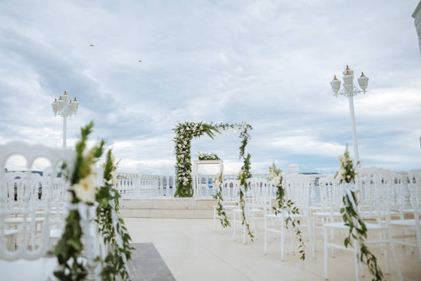 istock Beautiful wedding arch by the sea 2193591023