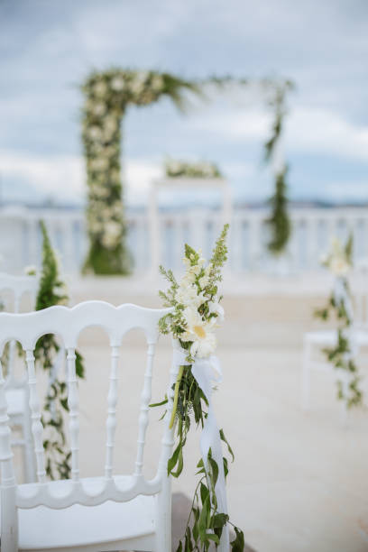 istock Beautiful wedding arch by the sea 2193591121
