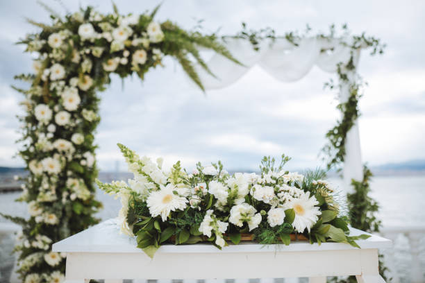 istock Beautiful wedding arch by the sea 2193591148